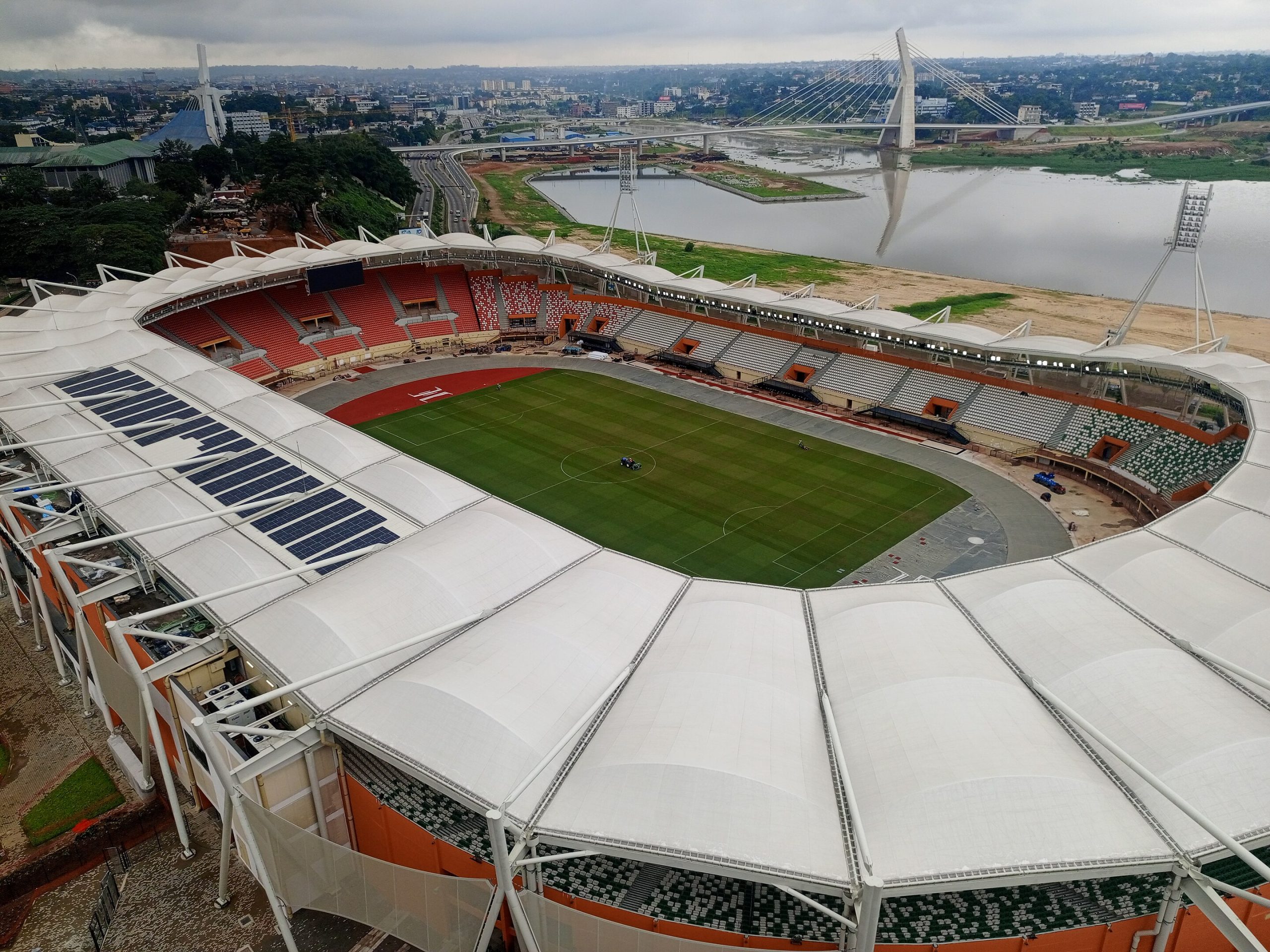 Stade Felix Houphouet-Boigny with Abidjan in the background.